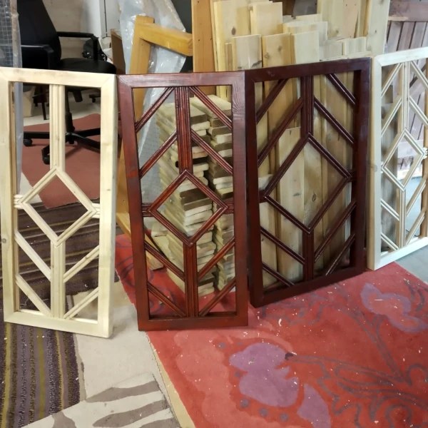 Wooden pagoda panels in workshop.